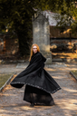 1741100763_wollumhang-mit-stickerei-alma-schwarz_1~5.webp